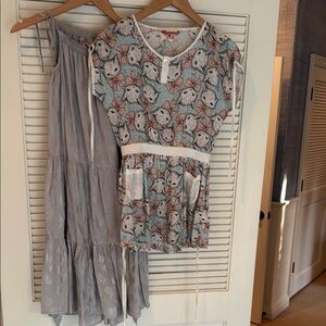 Set of Dresses - one is Blue, Pink & White. The other dress is silver size 8 yrs